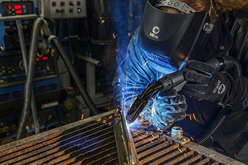 Image of live welding with a Clean Air fume extraction MIG gun