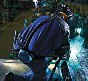 Image of a welder wearing a cool belt