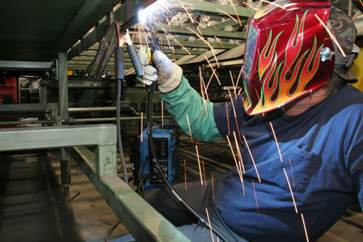 Image of person welding in a GMAW application