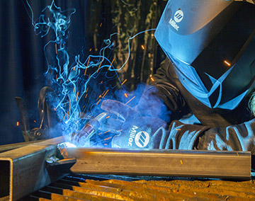 Image of a person welding