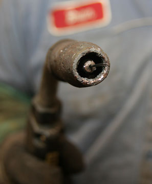 Image of a contact tip exposed to a lot of abuse during the normal course of welding. Regularly maintaining these products can extend their life and increase a company's productivity.