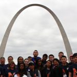 Image of the robotics team at Vincent Massey Secondary School in Windsor, Ontario, Canada standing in front of the Arch in St. Louis
