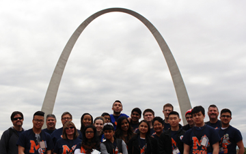 Image of the robotics team at Vincent Massey Secondary School in Windsor, Ontario, Canada standing in front of the Arch in St. Louis